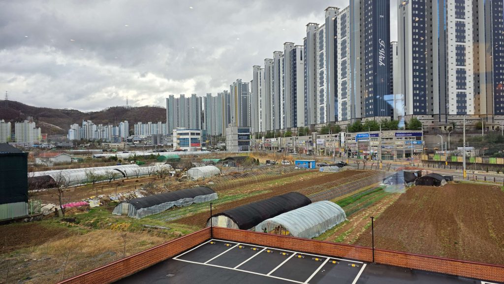 clear view of apartments and fields after rain with fresh air atmosphere