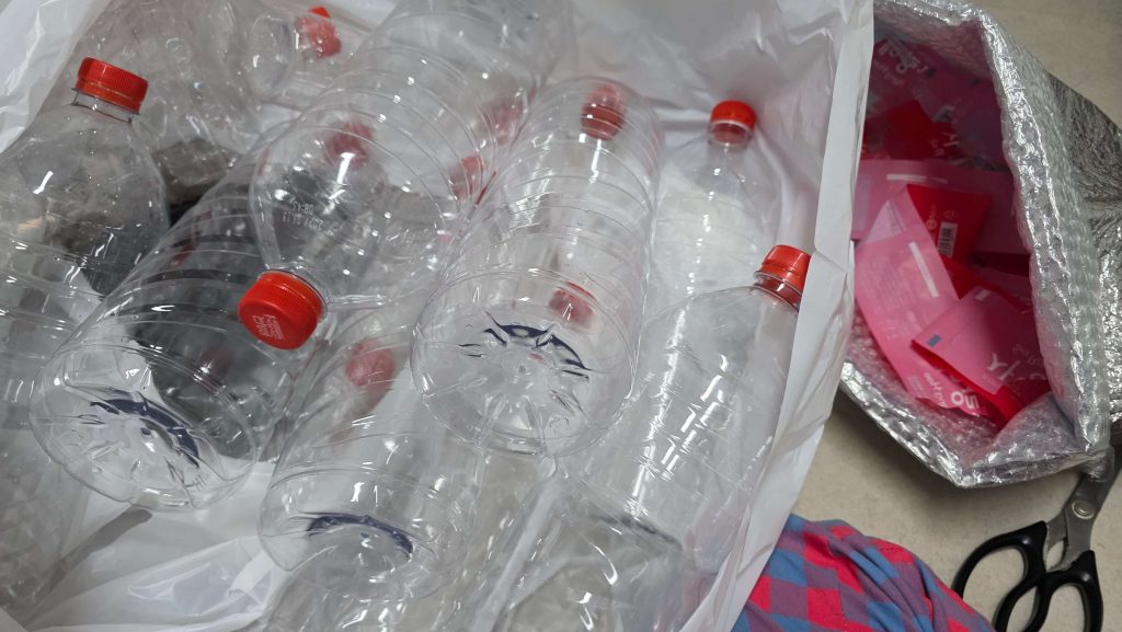 empty plastic bottles with labels removed at home