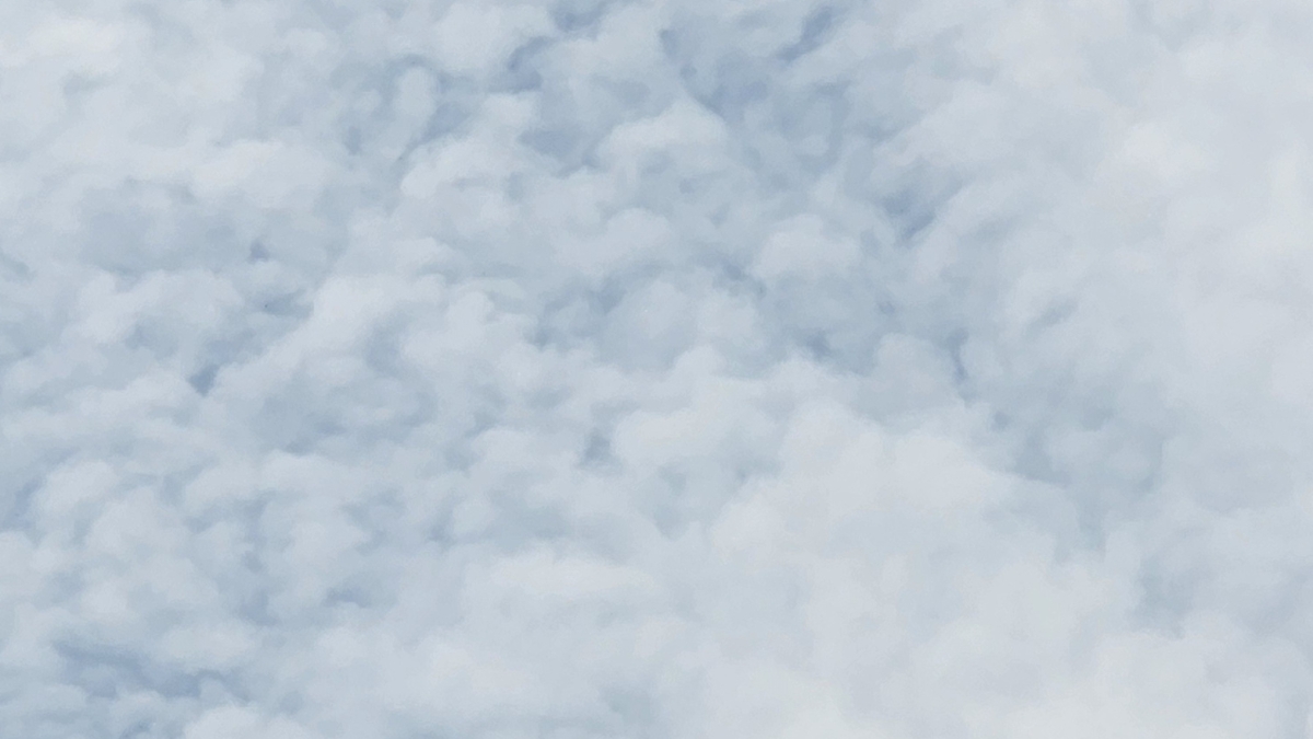 soft clouded sky with subtle light and calm atmosphere