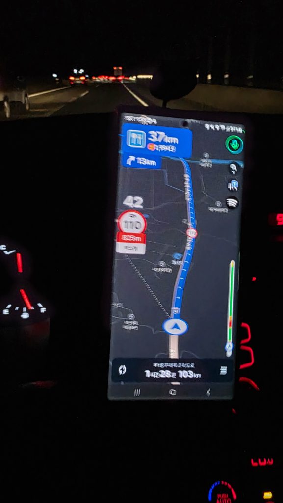 Blurred navigation screen during a long night drive while continuing past body signals