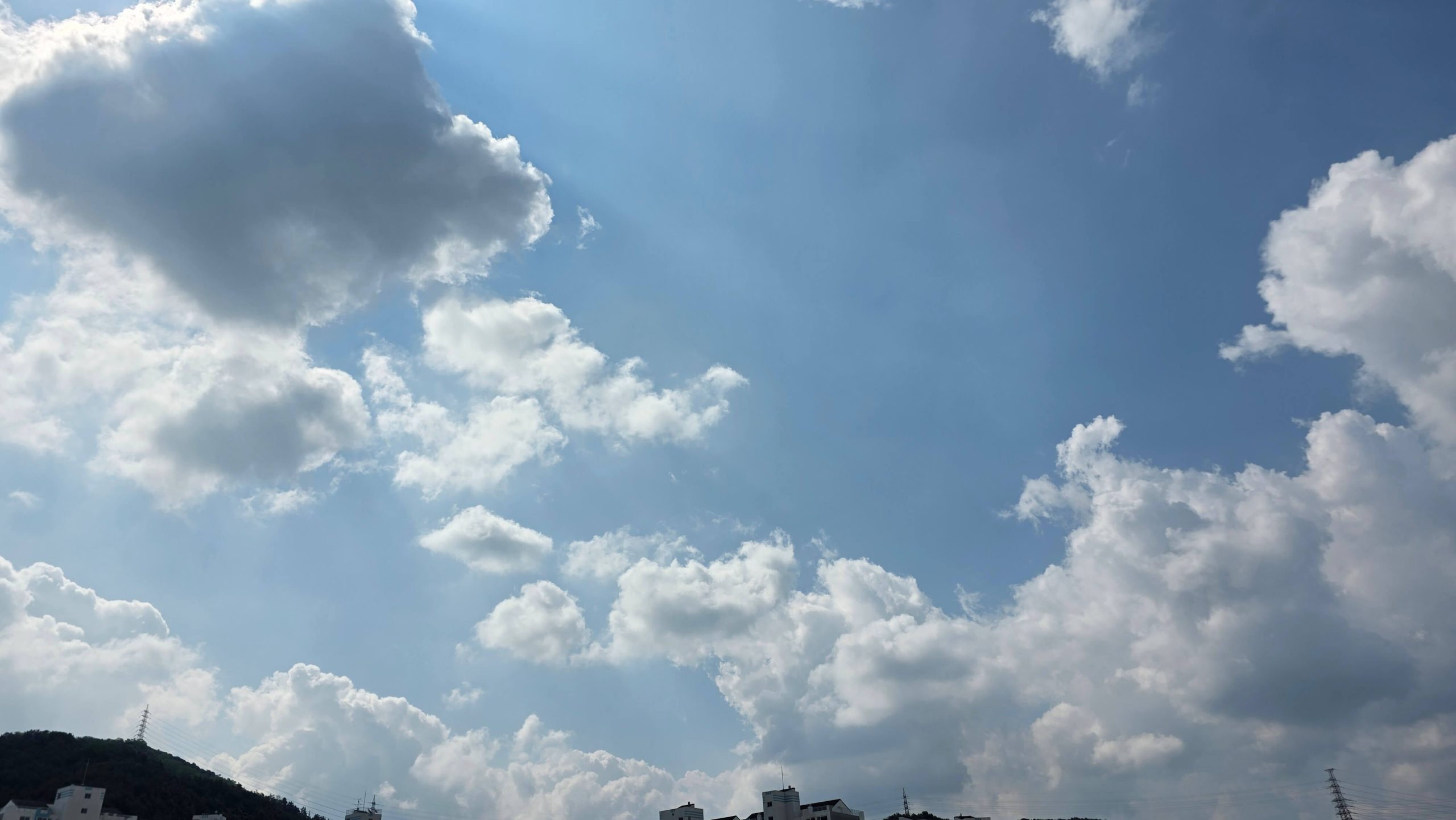 Morning sky with sunlight breaking through the clouds