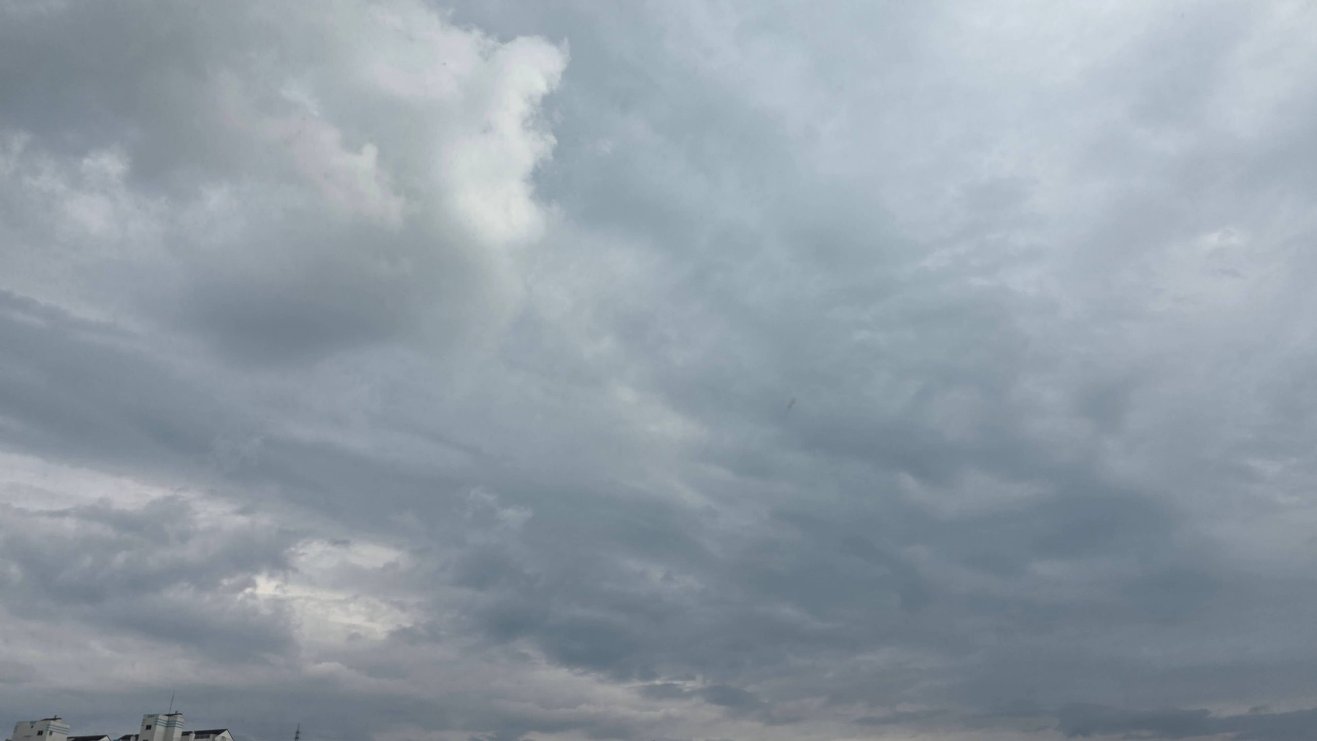 Cloudy sky reflecting a quiet moment of remembering your original rhythm