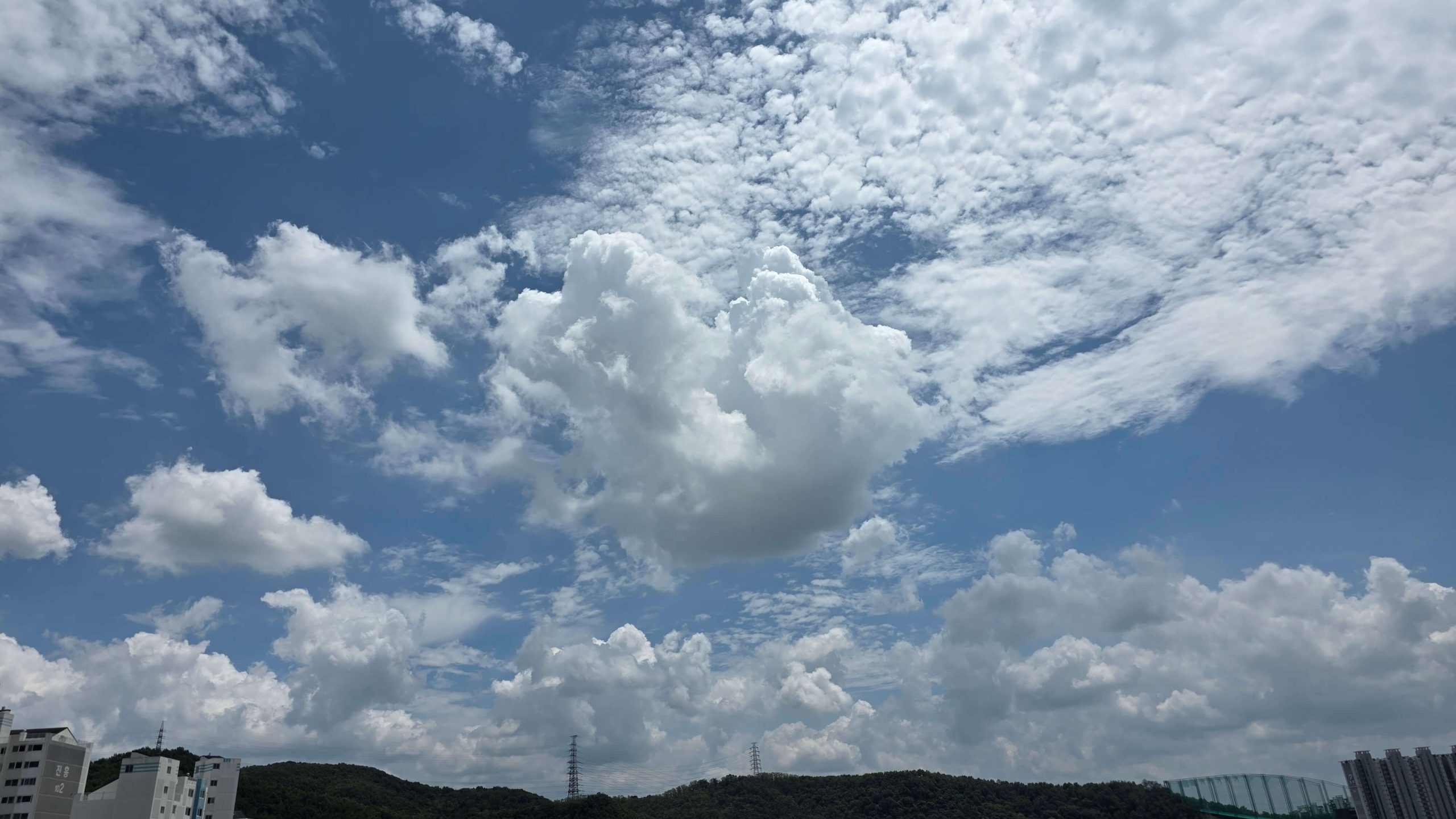 Blue summer sky above the indoor golf practice range where a simple reset began.