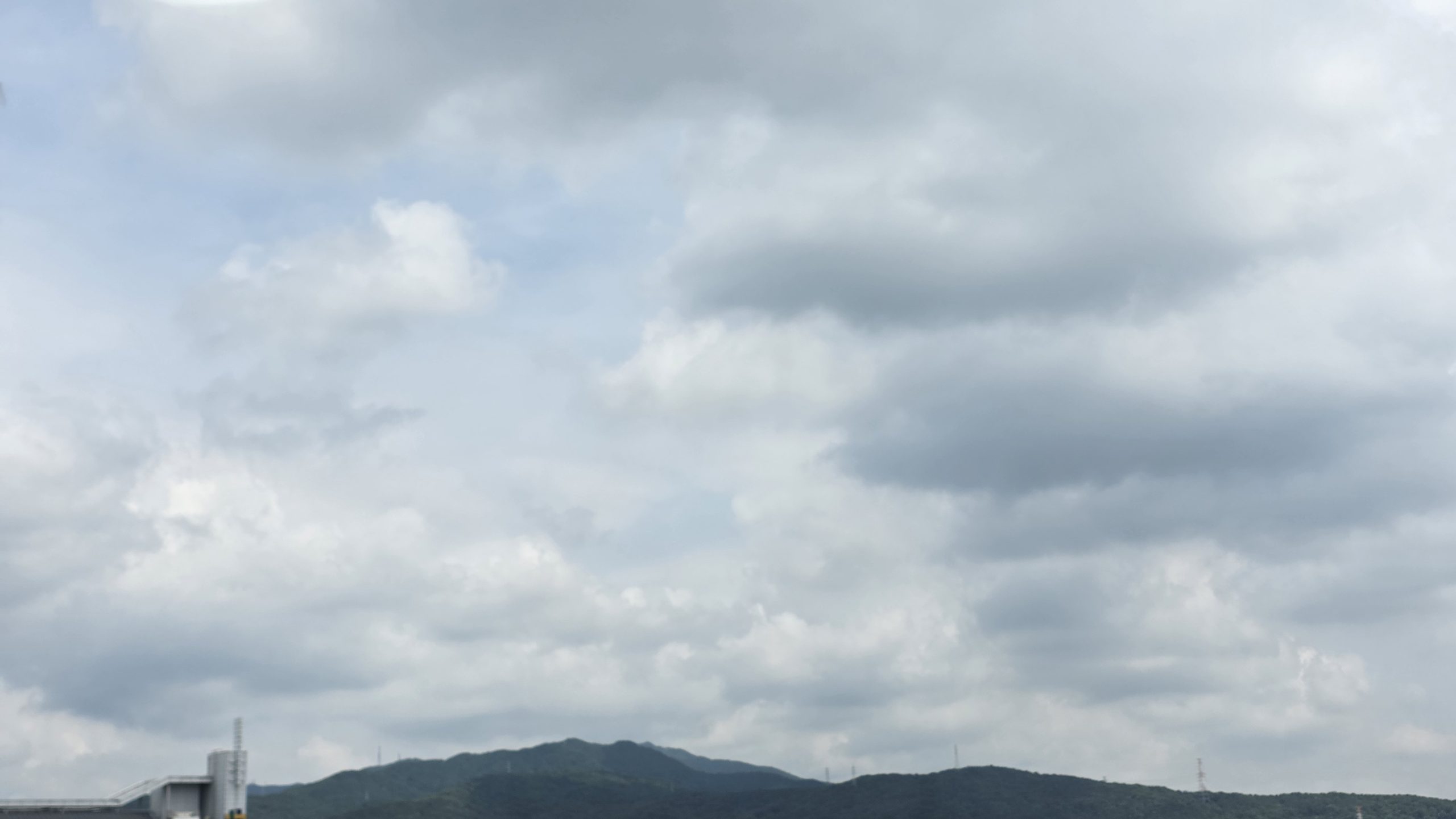 Cloudy sky above a quiet mountain on an ordinary morning