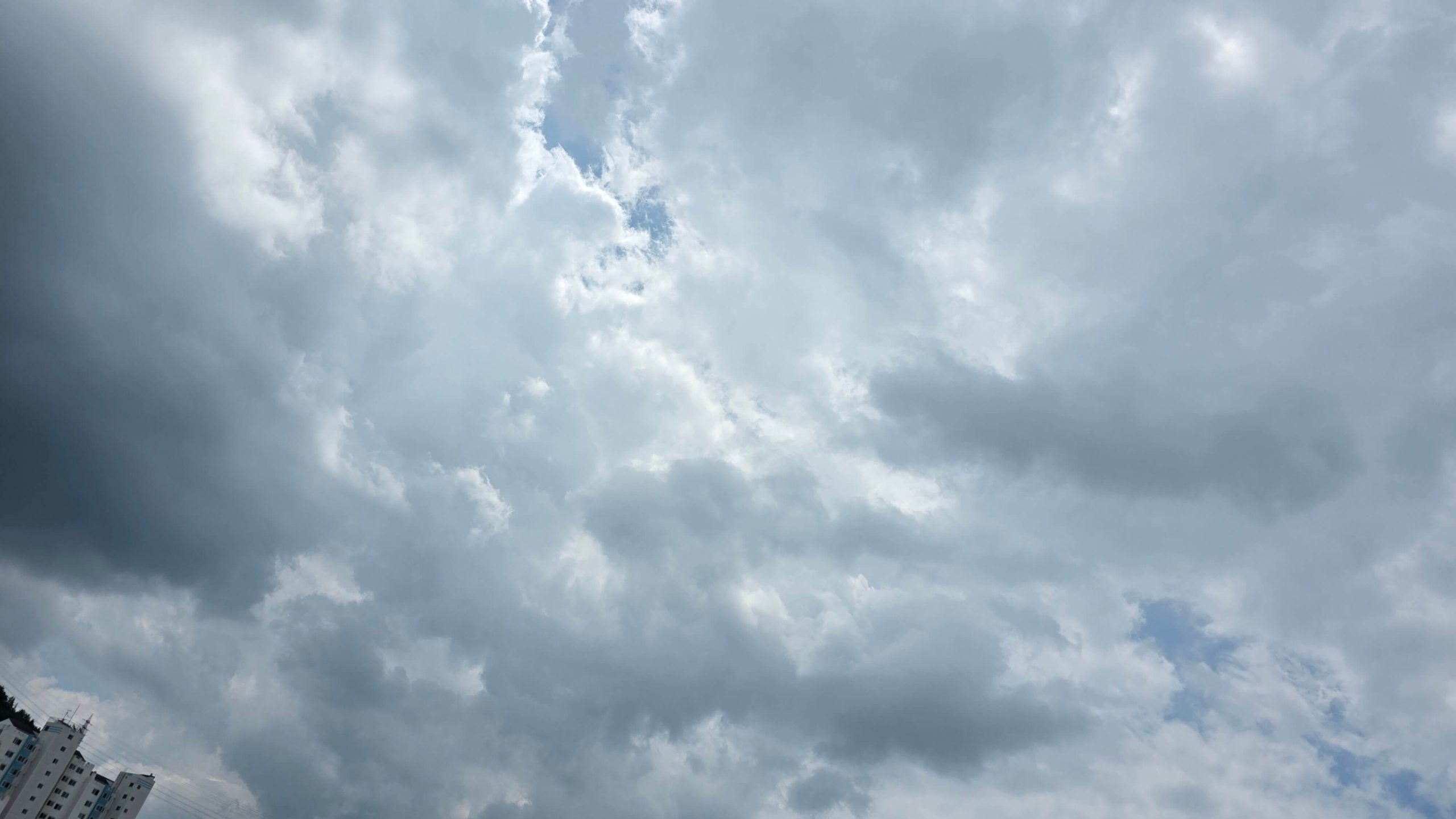 Clouds parting before the sky becomes clear