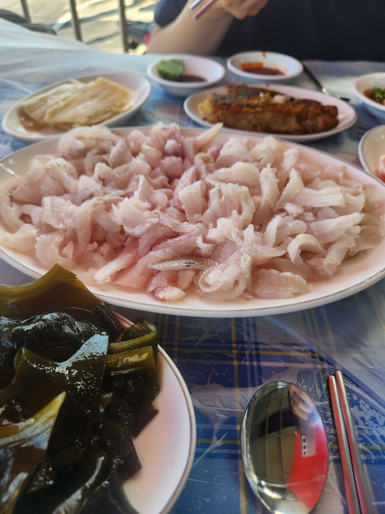 Fresh sliced fish at a small seaside restaurant in Korea.