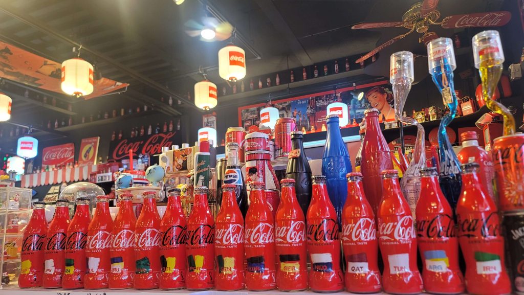 Qatar World Cup edition Coca-Cola bottles representing all sixteen World Cup teams